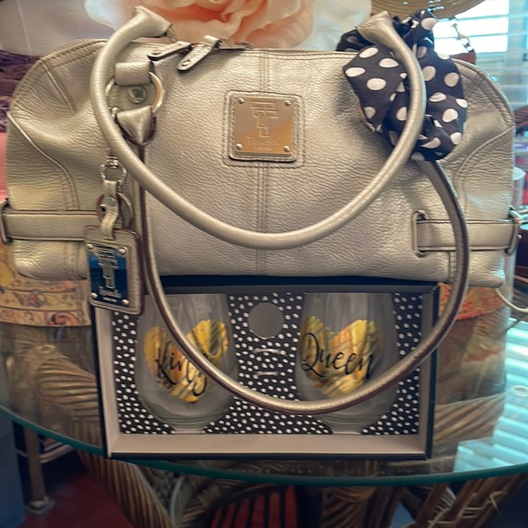 Tignanello Handbags - Tignanello since 1999 silver leather purse in great condition inside and out.
